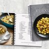 Kochbuch mit Kurkuma-Gericht